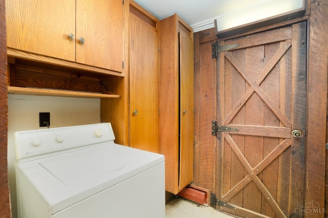 2765 Tater Ridge Rd, West Union, OH 45693 - washroom with washer / clothes dryer and cabinet space