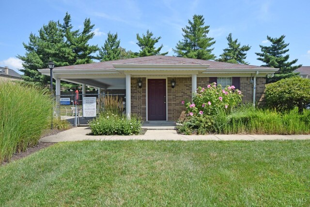 3016 Stratford Ct Unit 115, Cincinnati, OH 45140 - ranch-style house with a front yard and brick siding