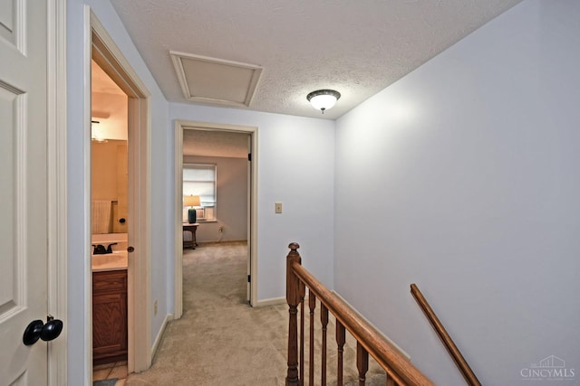 3016 Stratford Ct Unit 115, Cincinnati, OH 45140 - hall with light colored carpet, an upstairs landing, and a textured ceiling