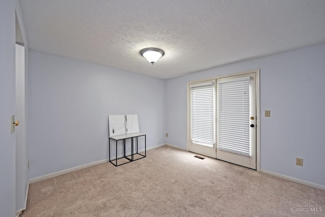 3016 Stratford Ct Unit 115, Cincinnati, OH 45140 - carpeted spare room with a textured ceiling and baseboards