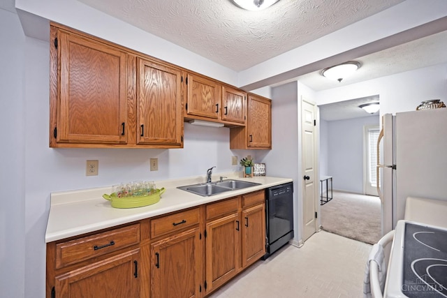3016 Stratford Ct Unit 115, Cincinnati, OH 45140 - kitchen featuring black dishwasher, freestanding refrigerator, range, light countertops, and brown cabinets