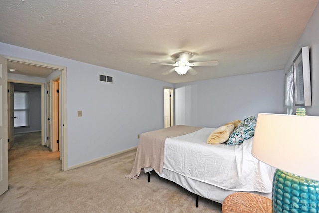 3016 Stratford Ct Unit 115, Cincinnati, OH 45140 - bedroom featuring light colored carpet, a ceiling fan, and a textured ceiling
