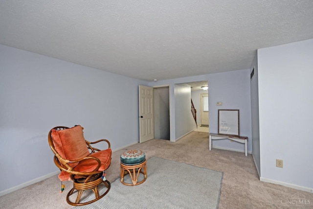 3016 Stratford Ct Unit 115, Cincinnati, OH 45140 - sitting room with carpet floors and a textured ceiling