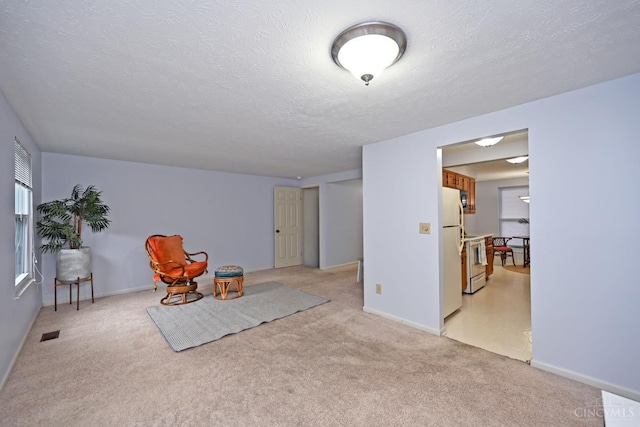 3016 Stratford Ct Unit 115, Cincinnati, OH 45140 - sitting room featuring light carpet and a textured ceiling