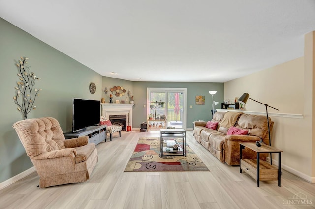 3435 Kleeman Lake Ct, Cincinnati, OH 45211 - living room featuring wood finished floors and a fireplace