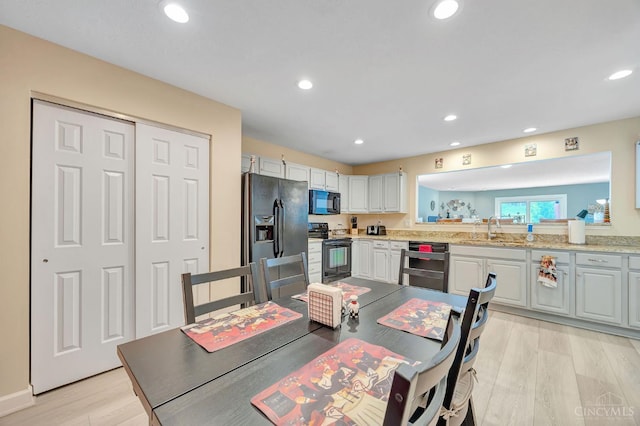 3435 Kleeman Lake Ct, Cincinnati, OH 45211 - dining area featuring light wood finished floors and recessed lighting