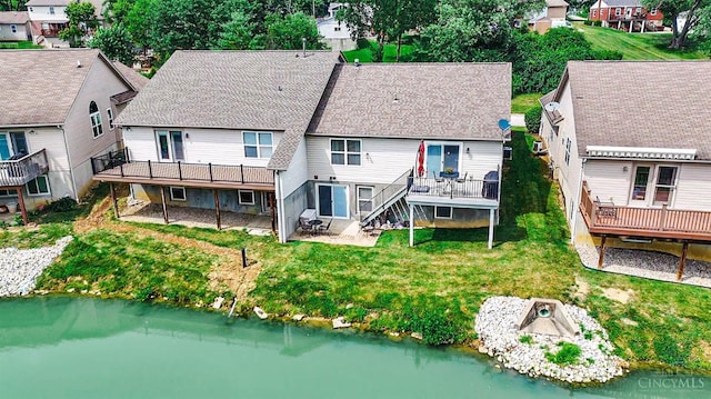 3435 Kleeman Lake Ct, Cincinnati, OH 45211 - rear view of property featuring a deck with water view, a residential view, a patio area, a yard, and stairs