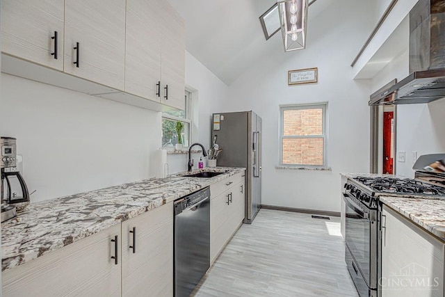 4213 Alex Ave, Cheviot, OH 45211 - kitchen with black appliances, range hood, light wood-style flooring, light stone counters, and high vaulted ceiling