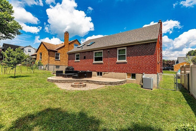4213 Alex Ave, Cheviot, OH 45211 - rear view of house featuring a fire pit, a gate, a fenced backyard, and brick siding
