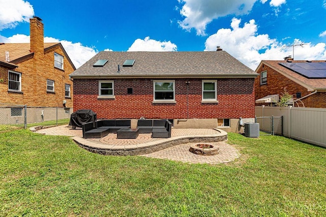 4213 Alex Ave, Cheviot, OH 45211 - back of property featuring a patio, an outdoor living space with a fire pit, a fenced backyard, and brick siding