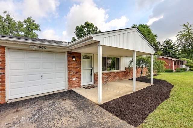 906 Shayler Rd, Union Twp, OH 45245 - ranch-style house featuring brick siding, asphalt driveway, an attached garage, and a front yard