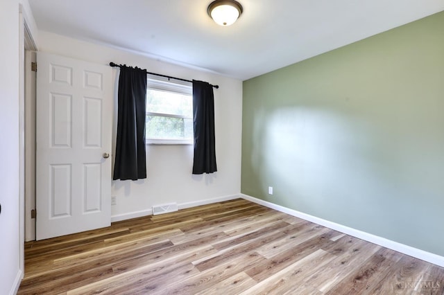 906 Shayler Rd, Union Twp, OH 45245 - empty room featuring wood finished floors and baseboards