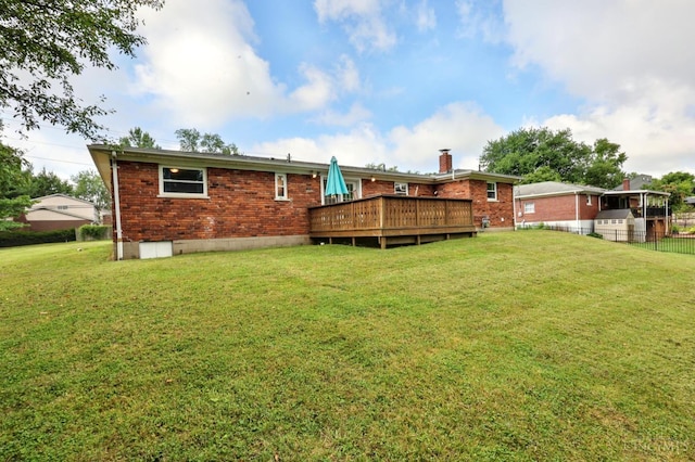 906 Shayler Rd, Union Twp, OH 45245 - back of house featuring a deck, brick siding, and a chimney