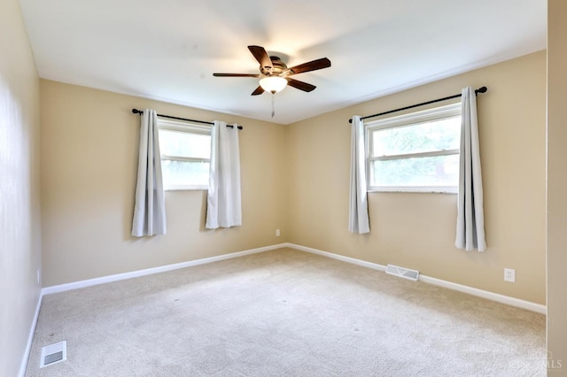 906 Shayler Rd, Union Twp, OH 45245 - unfurnished room featuring ceiling fan, healthy amount of natural light, and carpet flooring