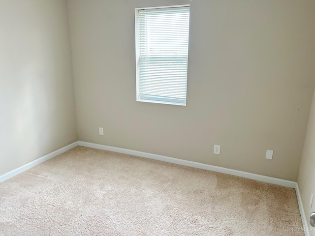 2247 Tucker Rd, Blanchester, OH 45107 - empty room with carpet floors and baseboards