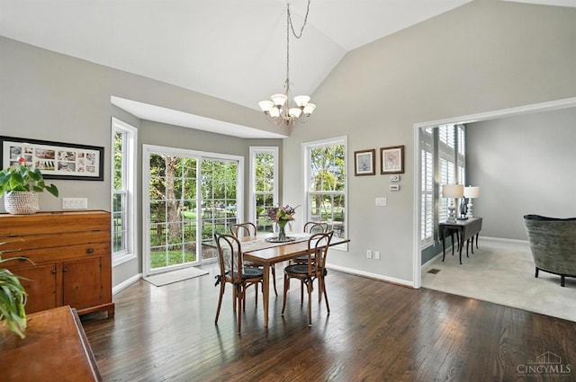 4048 Frye Park Cir, Mason, OH 45040 - dining space featuring plenty of natural light, dark wood-style flooring, a chandelier, and vaulted ceiling