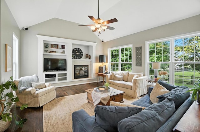4048 Frye Park Cir, Mason, OH 45040 - living area with ceiling fan, vaulted ceiling, wood finished floors, a tile fireplace, and built in shelves