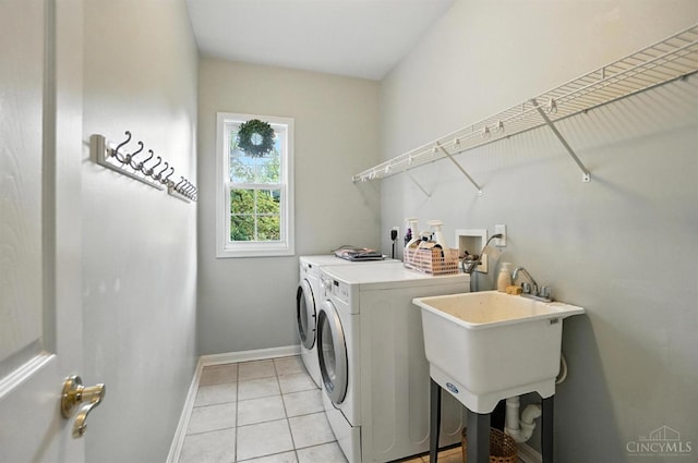 4048 Frye Park Cir, Mason, OH 45040 - laundry area with washing machine and clothes dryer and light tile patterned flooring