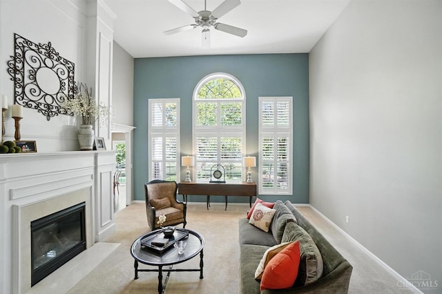 4048 Frye Park Cir, Mason, OH 45040 - living area with a fireplace, light colored carpet, and a ceiling fan