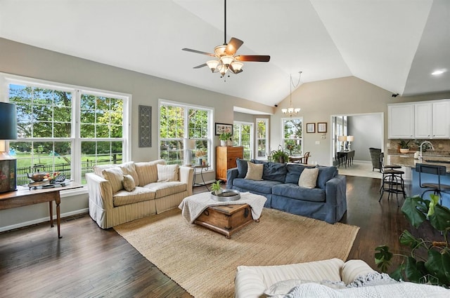 4048 Frye Park Cir, Mason, OH 45040 - living area featuring lofted ceiling, a ceiling fan, dark wood-style floors, and a chandelier