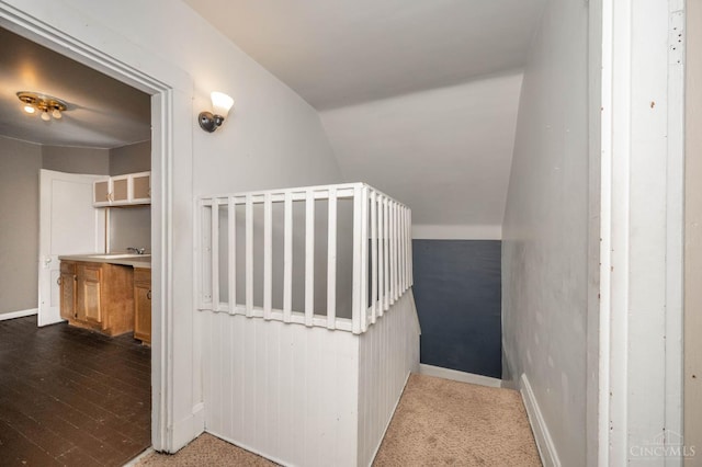5653 Prosser Ave, Elmwood Place, OH 45216 - stairs featuring vaulted ceiling and baseboards
