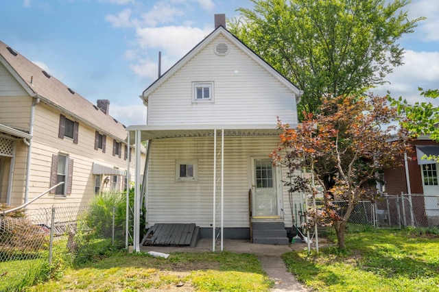 5653 Prosser Ave, Elmwood Place, OH 45216 - back of property featuring entry steps and a chimney
