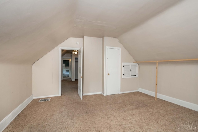 5653 Prosser Ave, Elmwood Place, OH 45216 - additional living space featuring carpet floors and vaulted ceiling