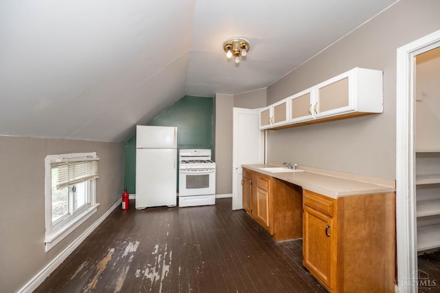 5653 Prosser Ave, Elmwood Place, OH 45216 - kitchen featuring white appliances, lofted ceiling, dark wood finished floors, light countertops, and glass insert cabinets