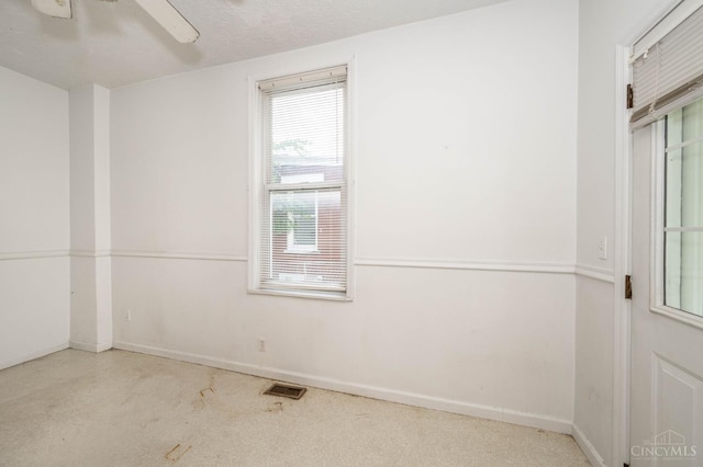 5653 Prosser Ave, Elmwood Place, OH 45216 - carpeted spare room with a ceiling fan and baseboards