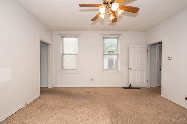 5653 Prosser Ave, Elmwood Place, OH 45216 - carpeted spare room featuring a ceiling fan and baseboards