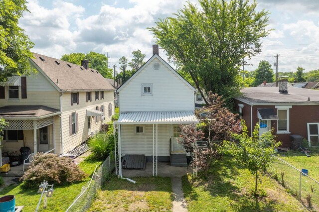 5653 Prosser Ave, Elmwood Place, OH 45216 - back of house with a metal roof