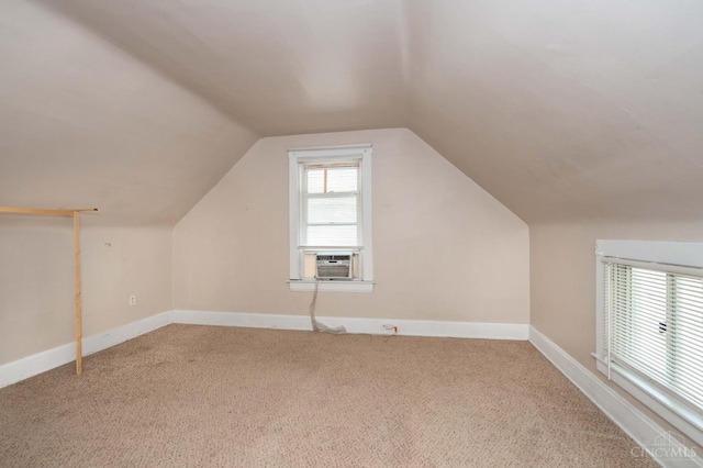 5653 Prosser Ave, Elmwood Place, OH 45216 - additional living space featuring lofted ceiling, carpet flooring, and cooling unit
