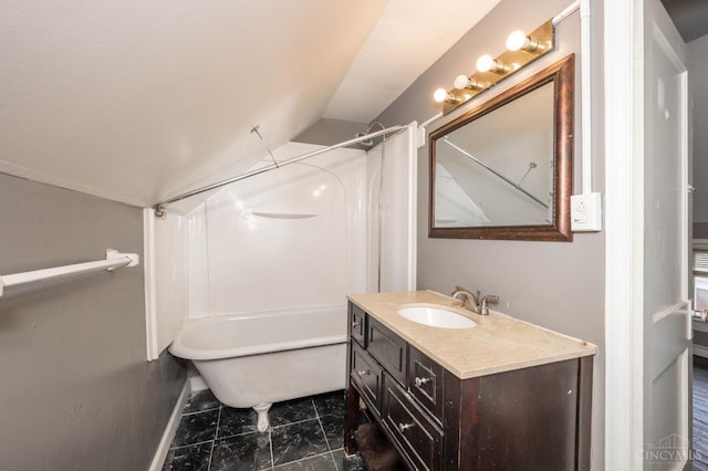 5653 Prosser Ave, Elmwood Place, OH 45216 - full bath with lofted ceiling, vanity, and marble look tiles