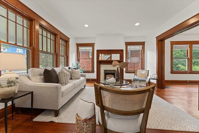 3131 Troy Ave, Cincinnati, OH 45213 - living room featuring wood finished floors, a fireplace, and recessed lighting