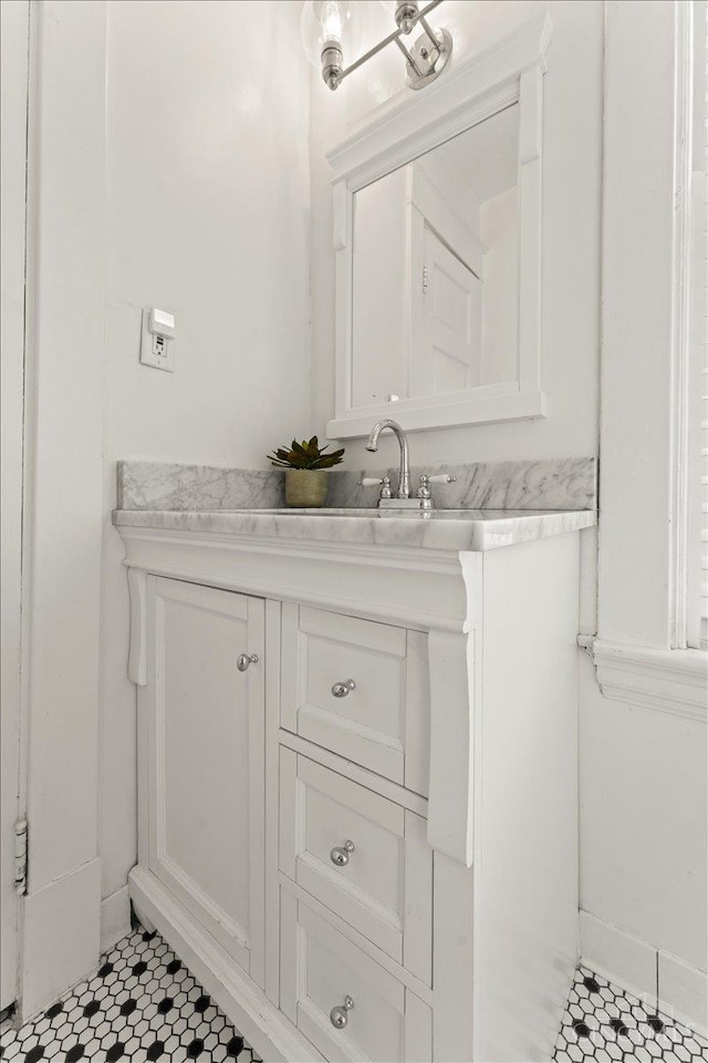 3131 Troy Ave, Cincinnati, OH 45213 - bathroom with tile patterned floors and vanity