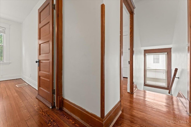 3131 Troy Ave, Cincinnati, OH 45213 - corridor with hardwood / wood-style floors and an upstairs landing