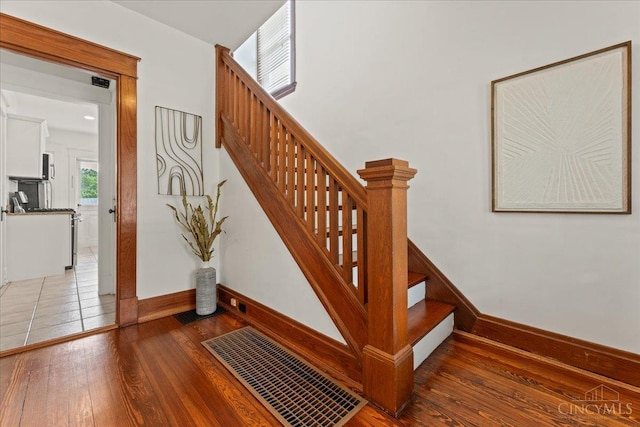 3131 Troy Ave, Cincinnati, OH 45213 - staircase featuring hardwood / wood-style floors