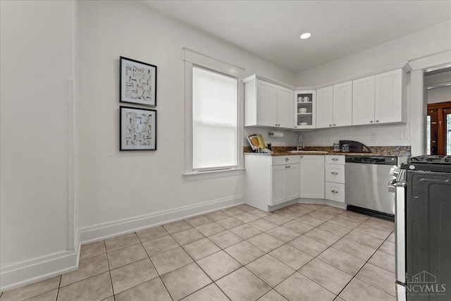 3131 Troy Ave, Cincinnati, OH 45213 - kitchen featuring appliances with stainless steel finishes, white cabinetry, light tile patterned floors, and recessed lighting