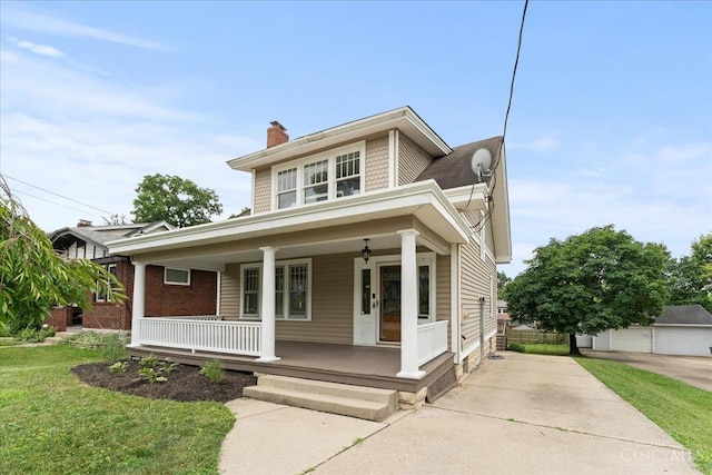 3131 Troy Ave, Cincinnati, OH 45213 - view of front of house featuring a chimney, a porch, and a front lawn