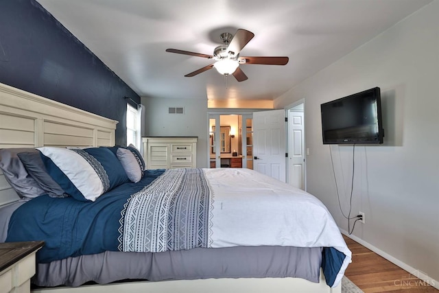 5681 Thomaridge Ct, Green Twp, OH 45248 - bedroom with wood finished floors and a ceiling fan