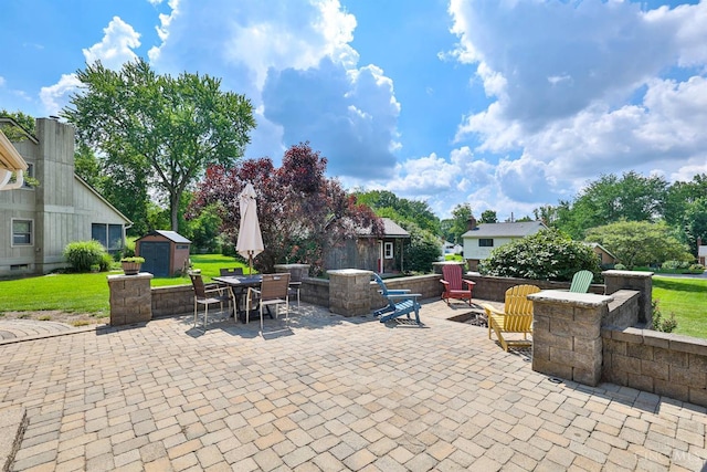 5681 Thomaridge Ct, Green Twp, OH 45248 - view of patio featuring a shed and outdoor dining area