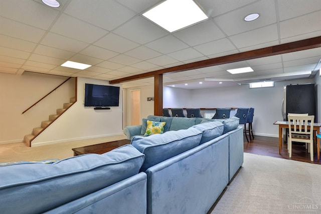 5681 Thomaridge Ct, Green Twp, OH 45248 - living area with carpet flooring, a drop ceiling, and stairs