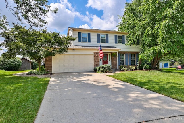5681 Thomaridge Ct, Green Twp, OH 45248 - view of front of property with brick siding, a garage, a front yard, and driveway