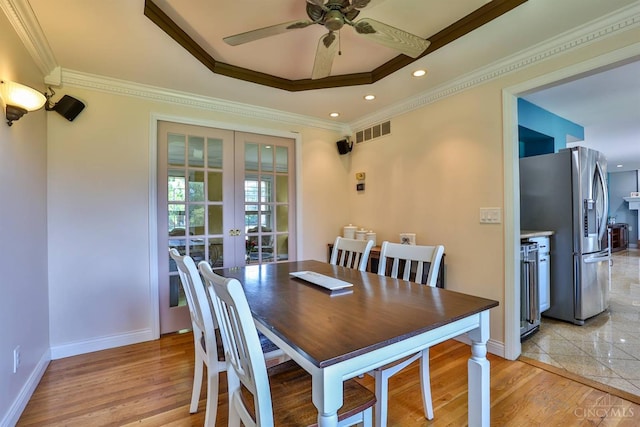 5681 Thomaridge Ct, Green Twp, OH 45248 - dining area with french doors, ceiling fan, ornamental molding, recessed lighting, and a raised ceiling