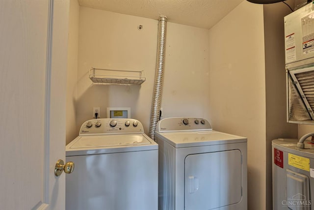 4282 Hickory Park Ln, Batavia Twp, OH 45103 - laundry area featuring electric water heater and washing machine and dryer