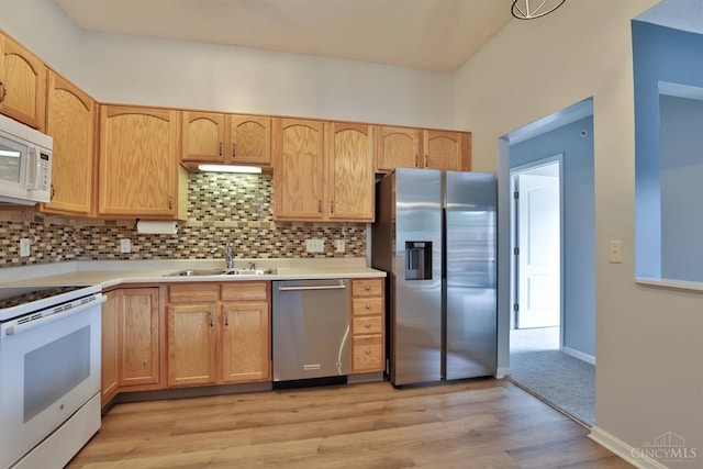 4282 Hickory Park Ln, Batavia Twp, OH 45103 - kitchen with appliances with stainless steel finishes, light brown cabinetry, tasteful backsplash, light countertops, and light wood-style floors