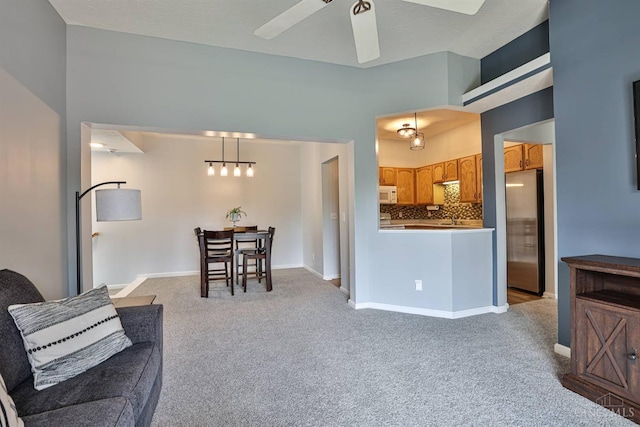 4282 Hickory Park Ln, Batavia Twp, OH 45103 - carpeted living area featuring baseboards and ceiling fan