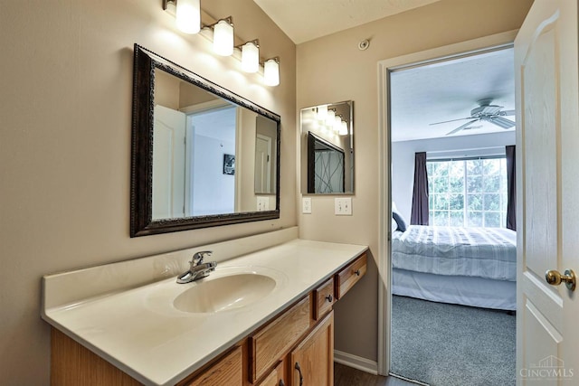 4282 Hickory Park Ln, Batavia Twp, OH 45103 - bathroom featuring vanity, connected bathroom, and a ceiling fan