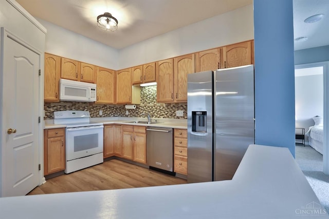 4282 Hickory Park Ln, Batavia Twp, OH 45103 - kitchen featuring appliances with stainless steel finishes, tasteful backsplash, light brown cabinetry, and light countertops