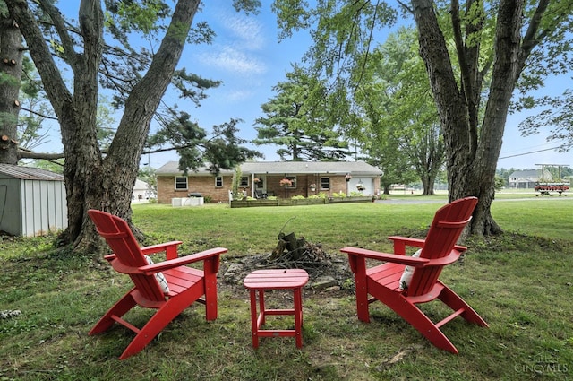 8135 Faller Rd, Hamilton Twp, OH 45039 - view of grassy yard featuring a storage unit